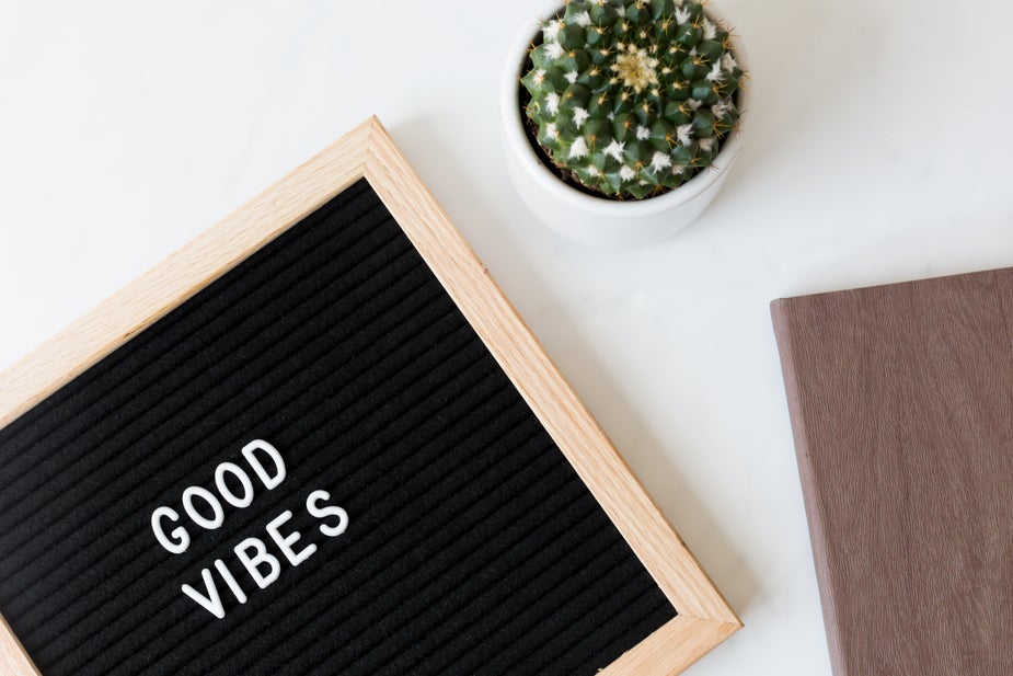 good vibes sign flatlay